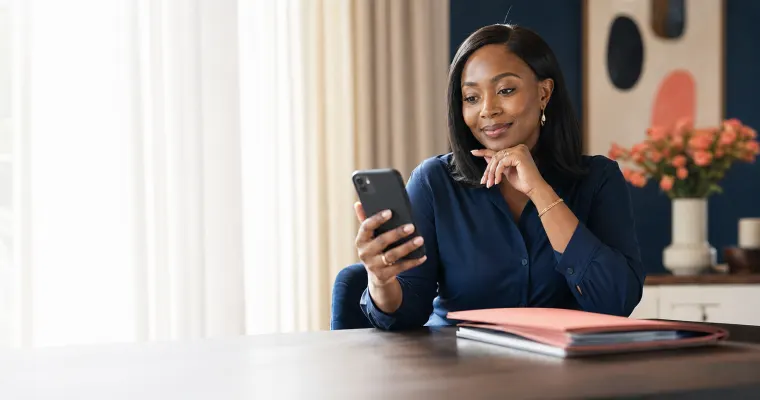 A customer checking her insurance on her phone